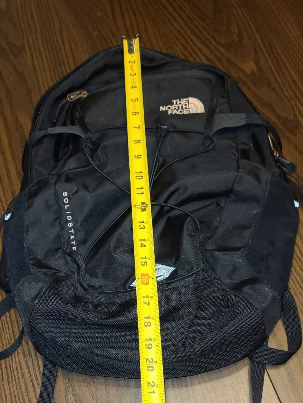 The North Face Black Solid State Backpack With Rose Gold Logo